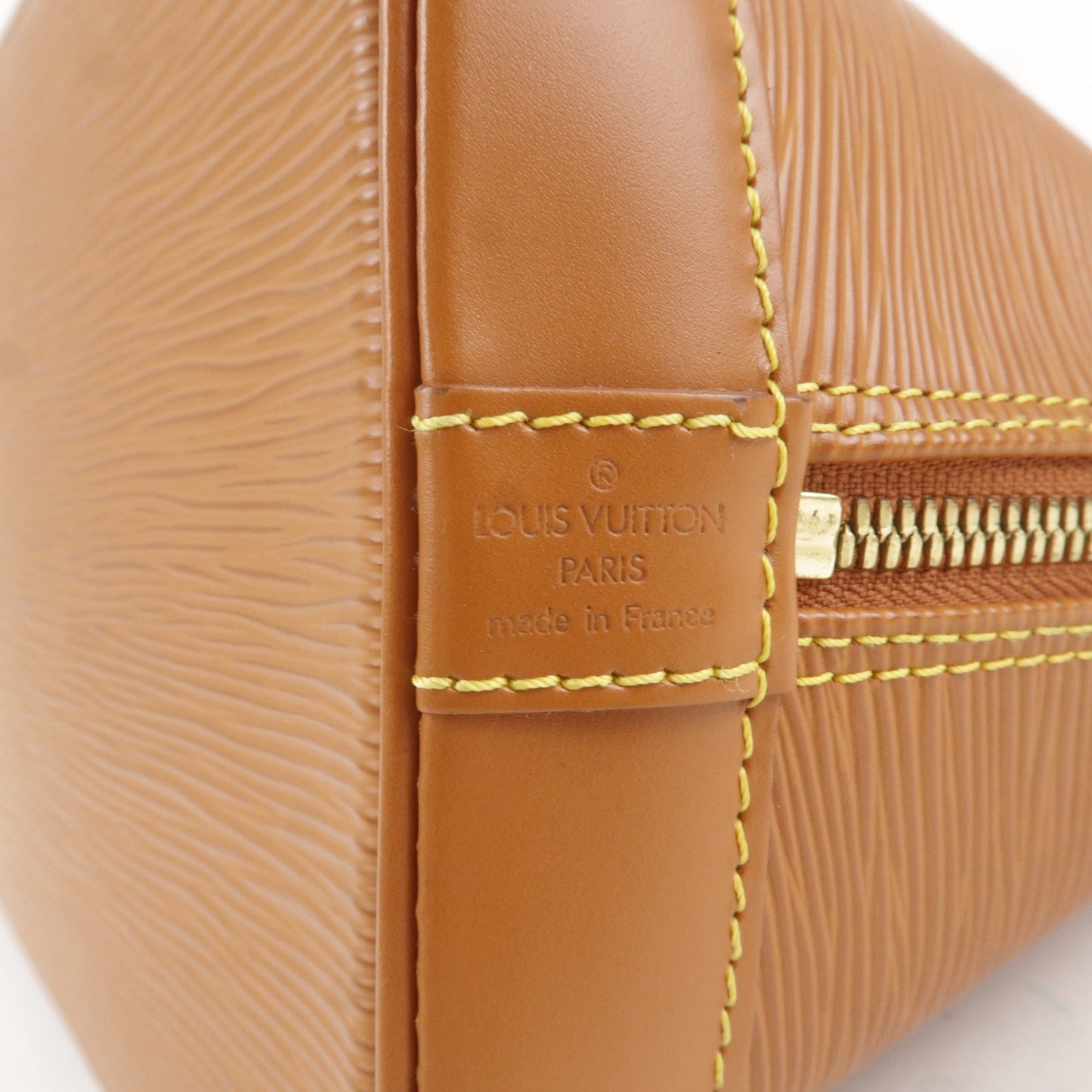 Louis Vuitton Epi Alma Hand Bag Zipang Gold M54148