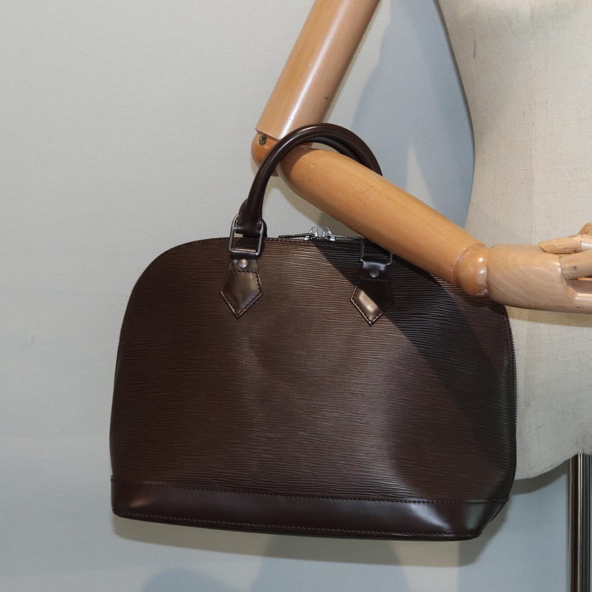 LOUIS VUITTON Alma Handbag