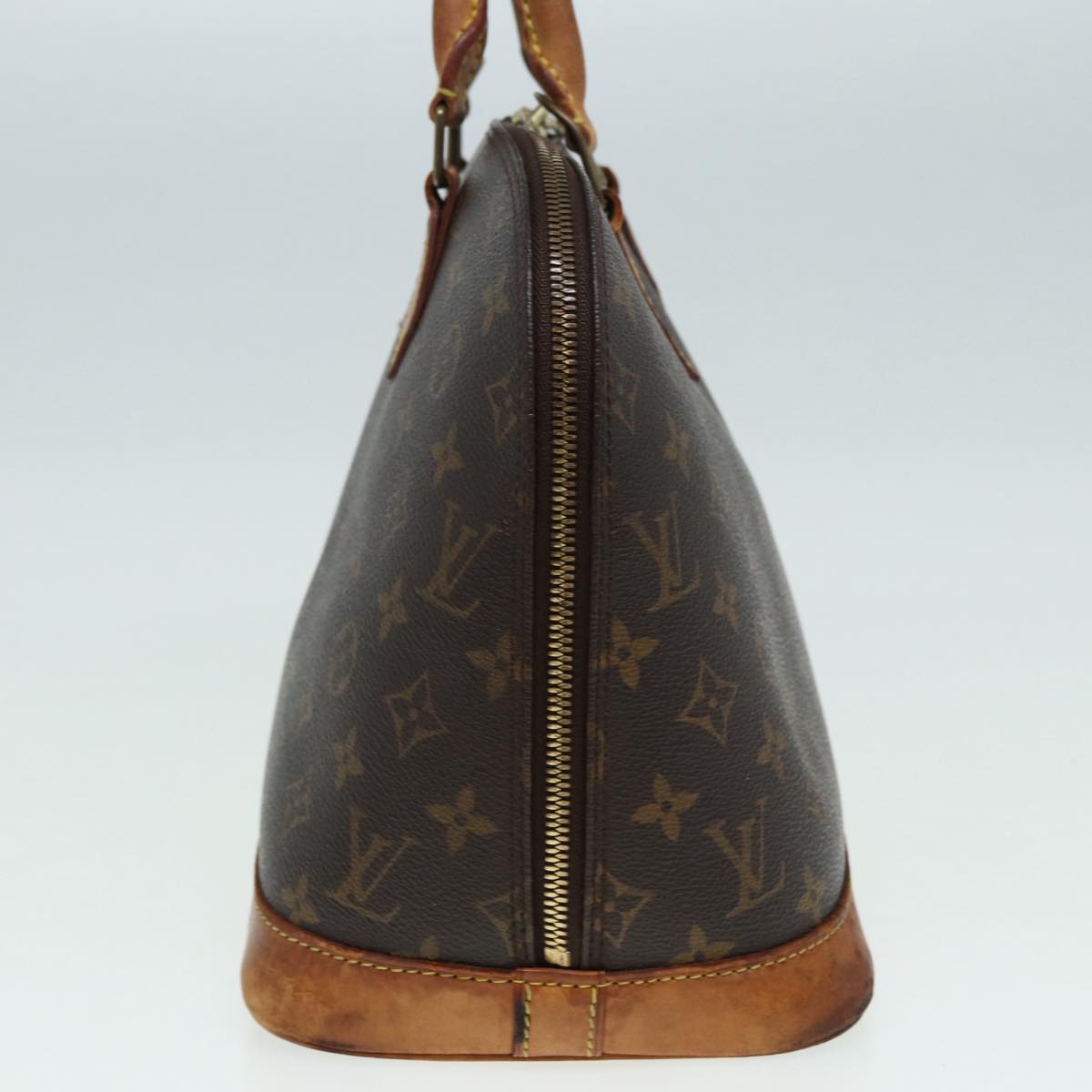 LOUIS VUITTON Alma Handbag