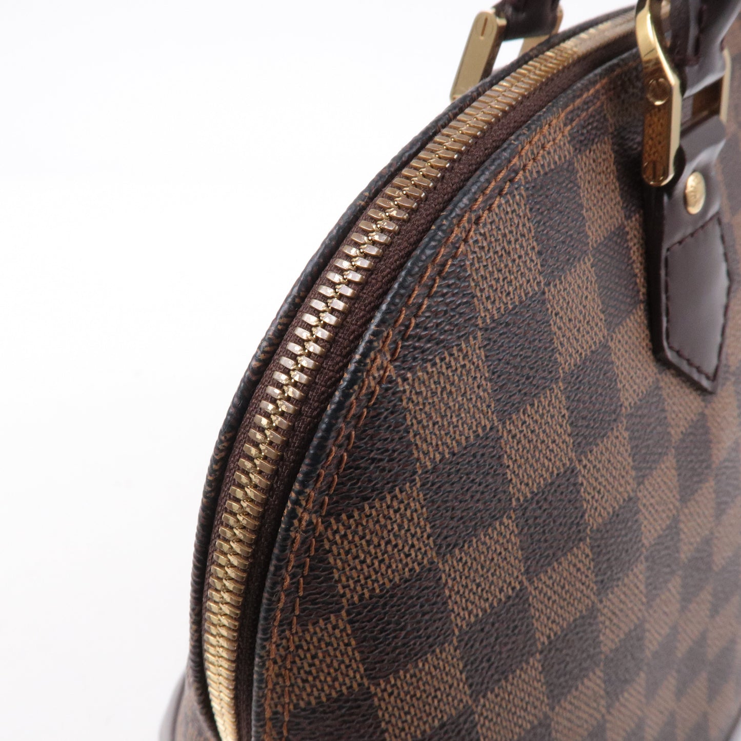 Louis Vuitton Damier Ebene Alma Hand Bag Brown N51131
