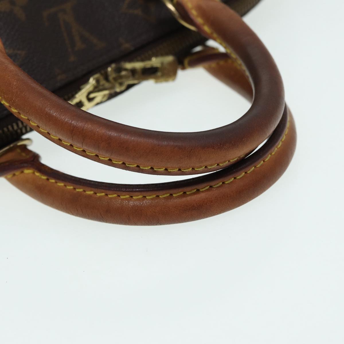 LOUIS VUITTON Alma Handbag
