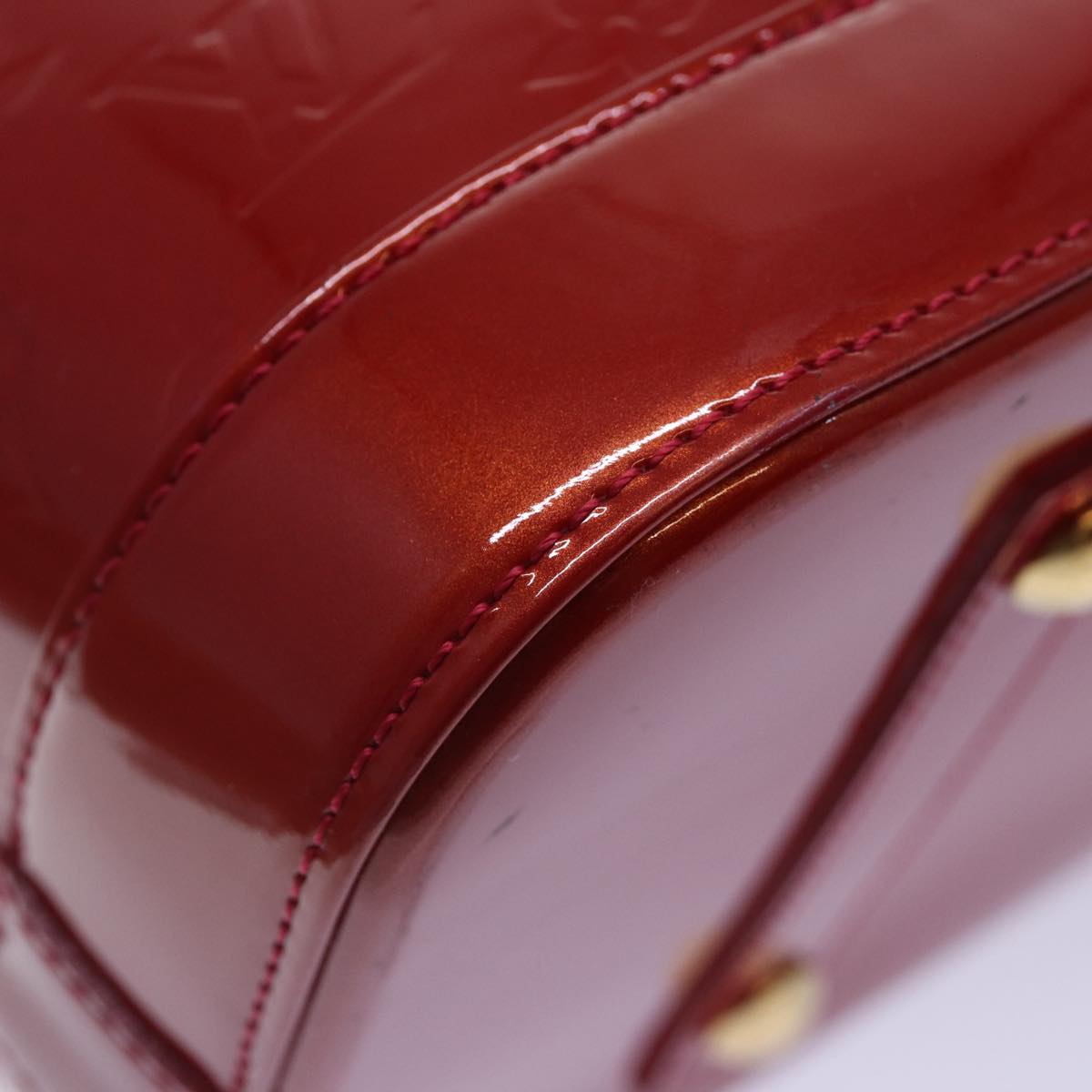 LOUIS VUITTON Alma Handbag
