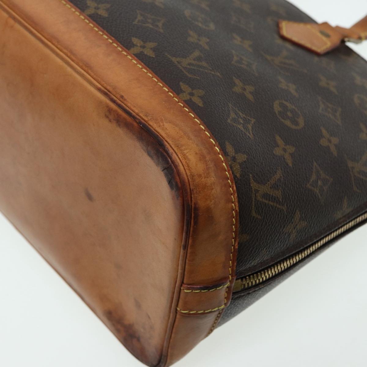 LOUIS VUITTON Alma Handbag