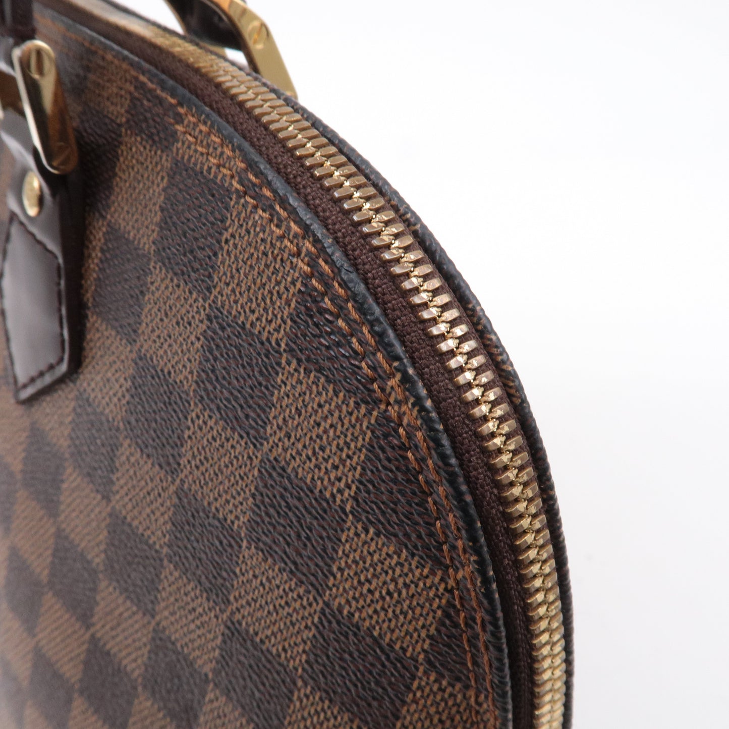 Louis Vuitton Damier Ebene Alma Hand Bag Brown N51131