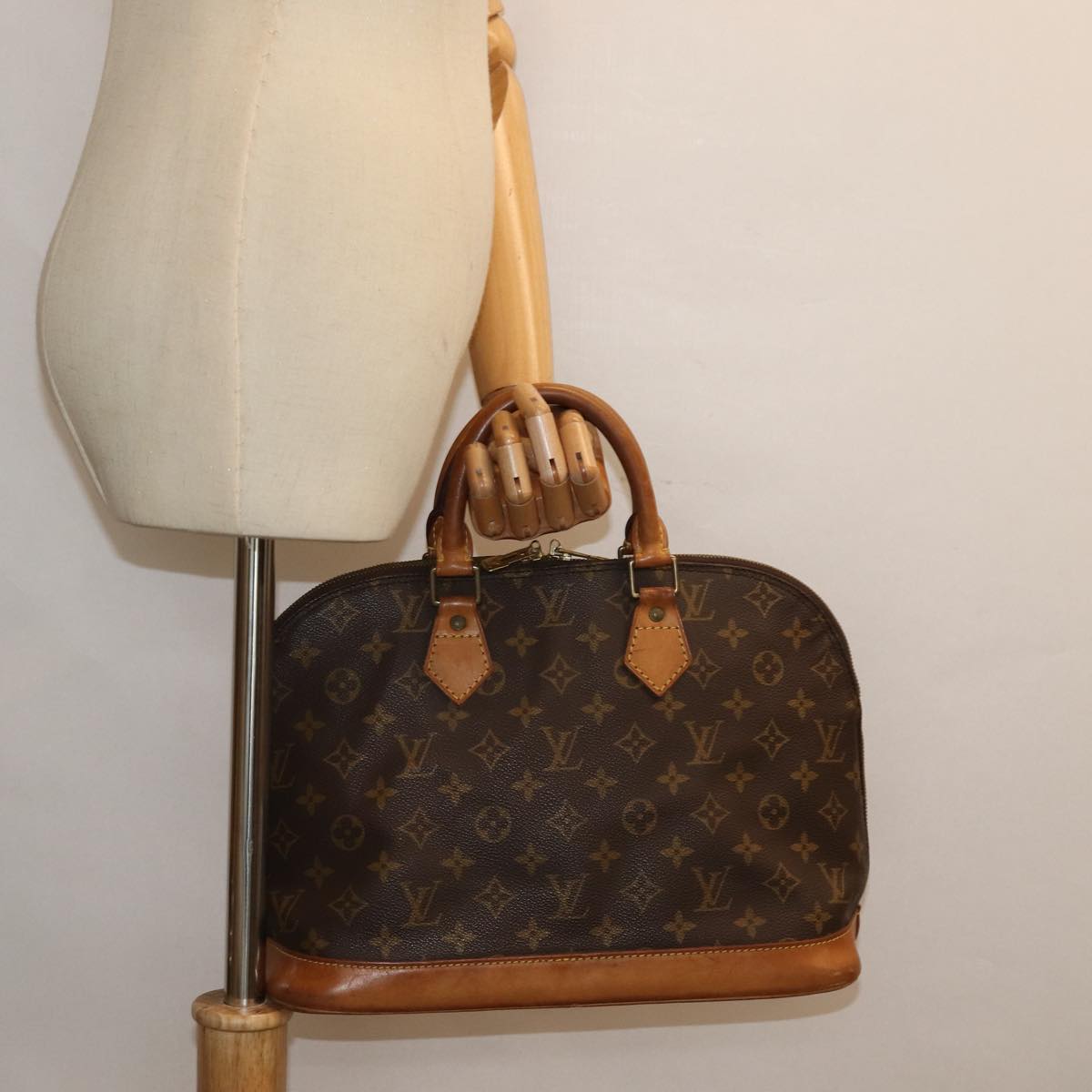 LOUIS VUITTON Alma Handbag