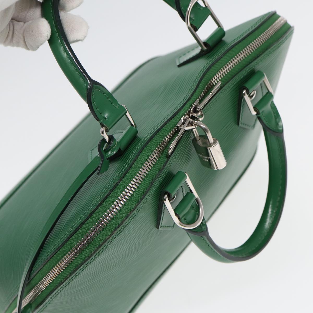 LOUIS VUITTON Alma Handbag