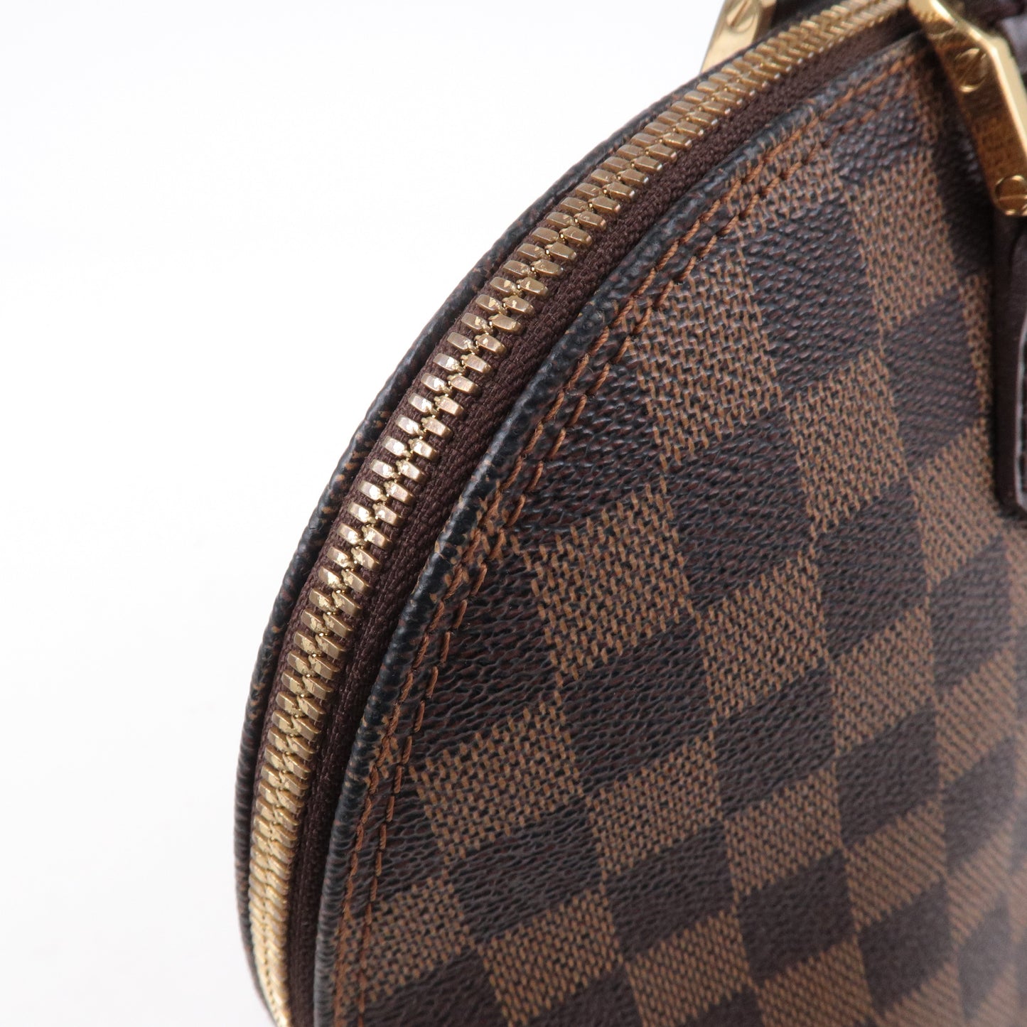 Louis Vuitton Damier Ebene Alma Hand Bag Brown N51131