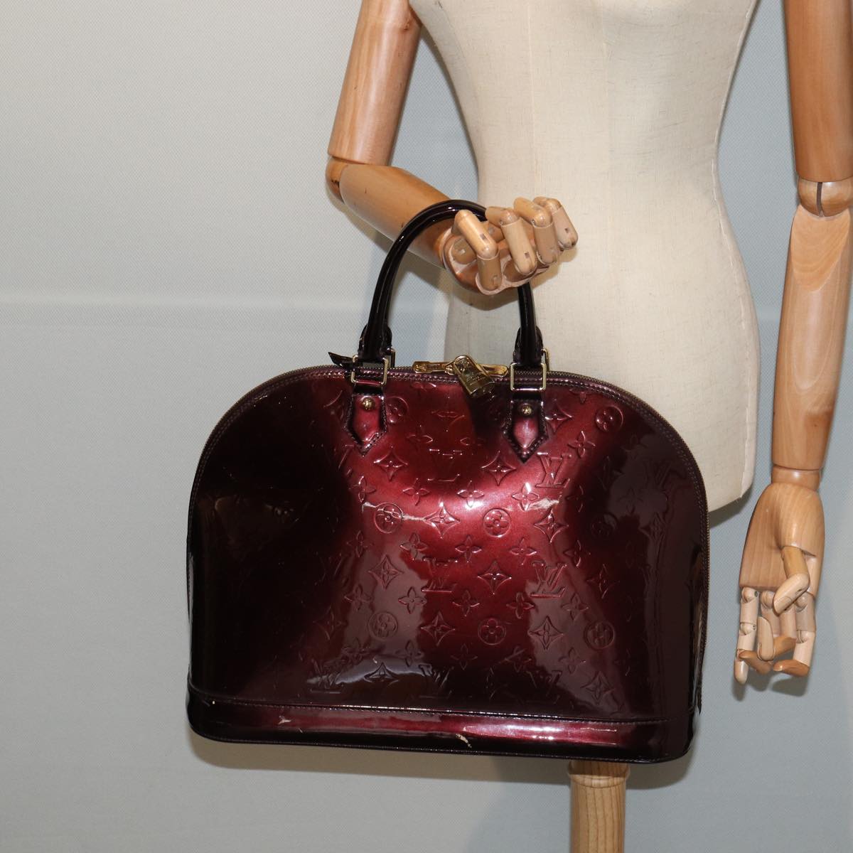 LOUIS VUITTON Alma Handbag
