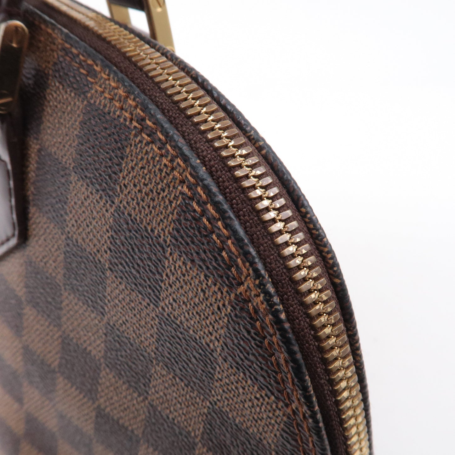 Louis Vuitton Damier Ebene Alma Hand Bag Brown N51131
