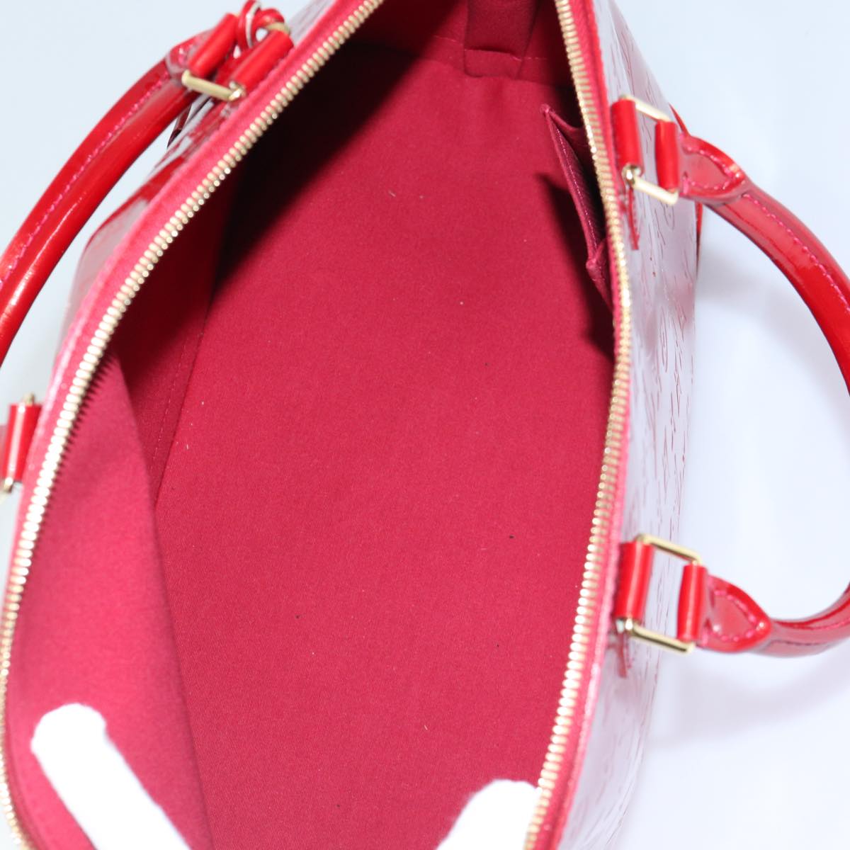 LOUIS VUITTON Alma Handbag