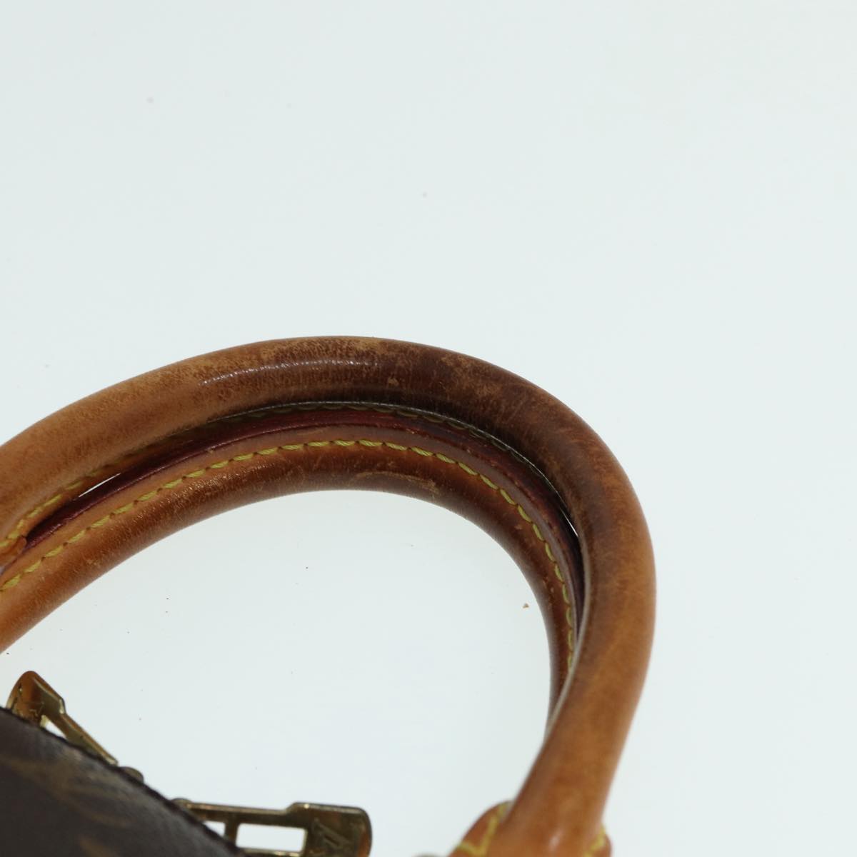 LOUIS VUITTON Alma Handbag