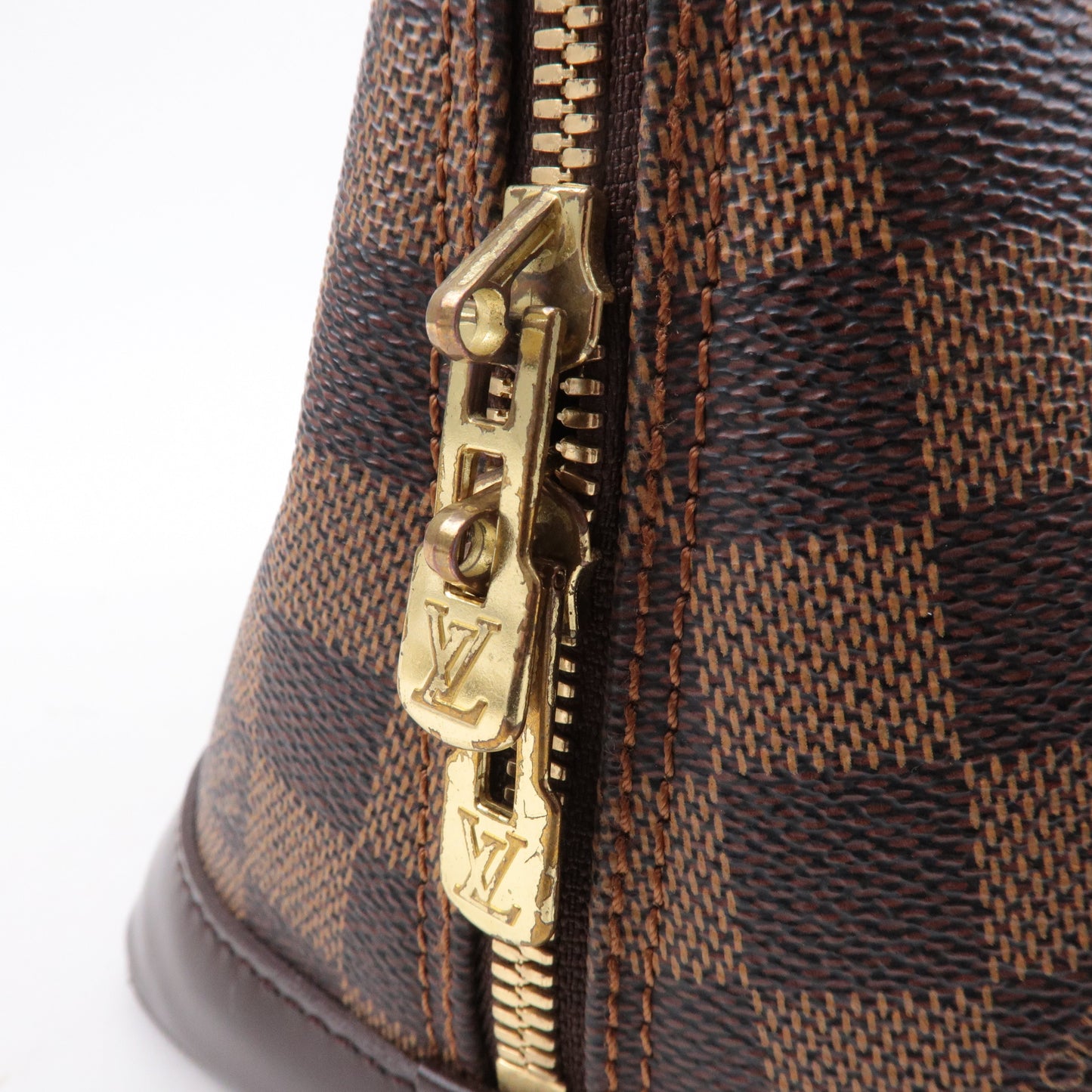 Louis Vuitton Damier Ebene Alma Hand Bag Brown N51131