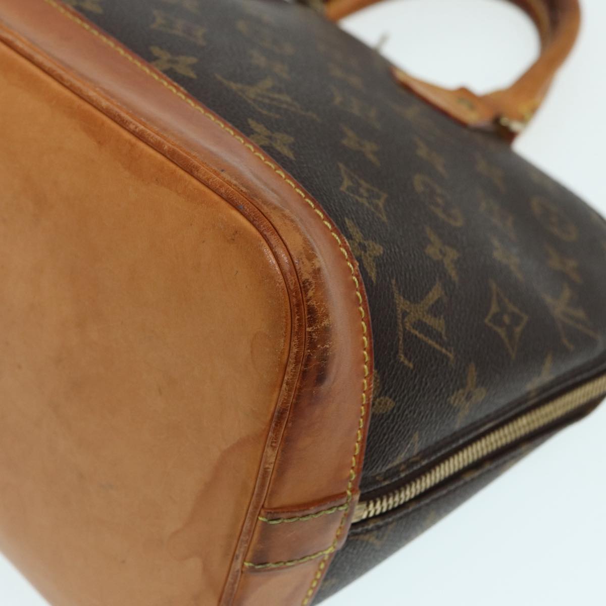 LOUIS VUITTON Alma Handbag
