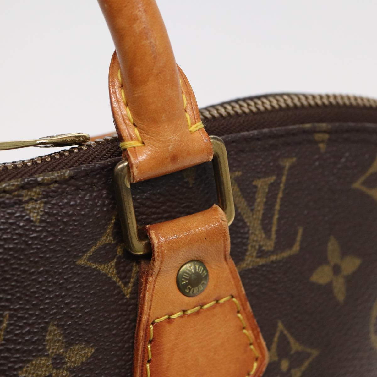 LOUIS VUITTON Alma Handbag