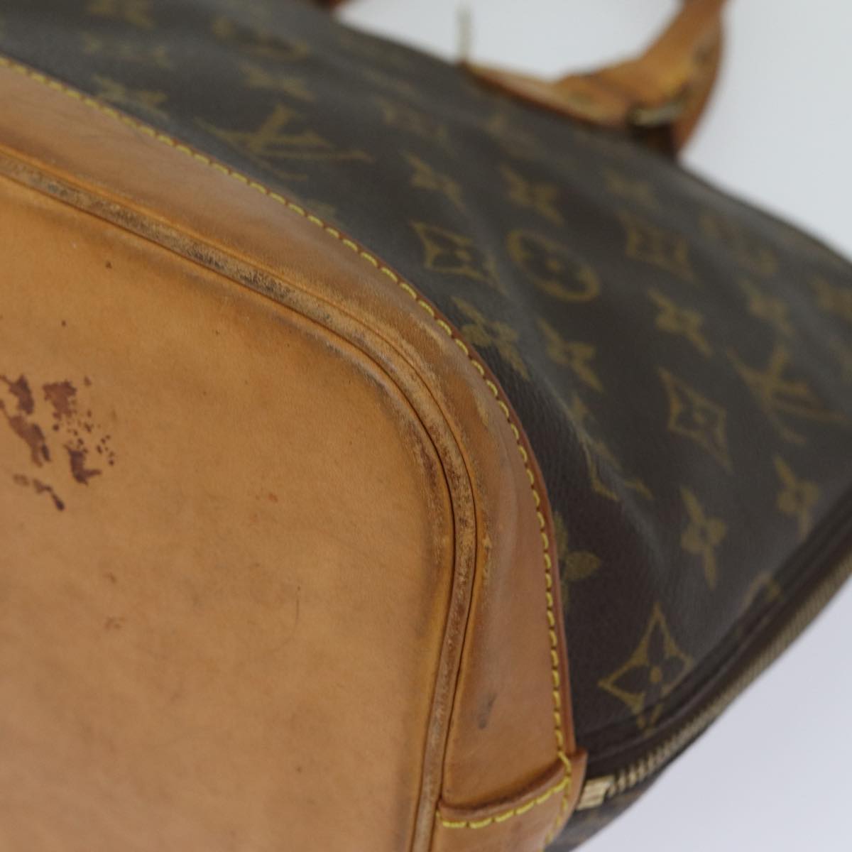 LOUIS VUITTON Alma Handbag