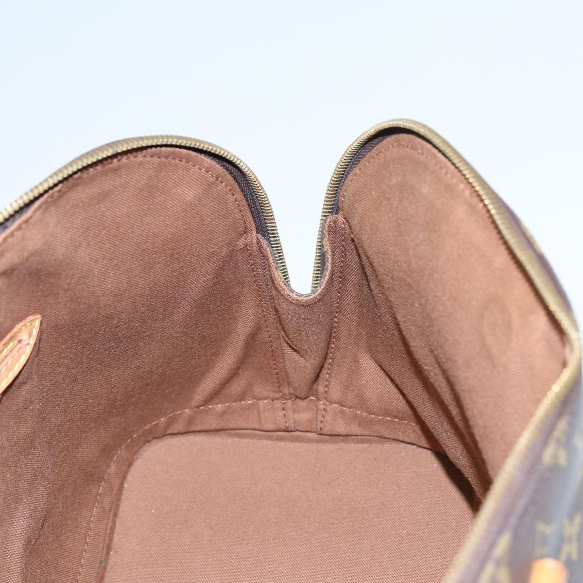 LOUIS VUITTON Alma Handbag