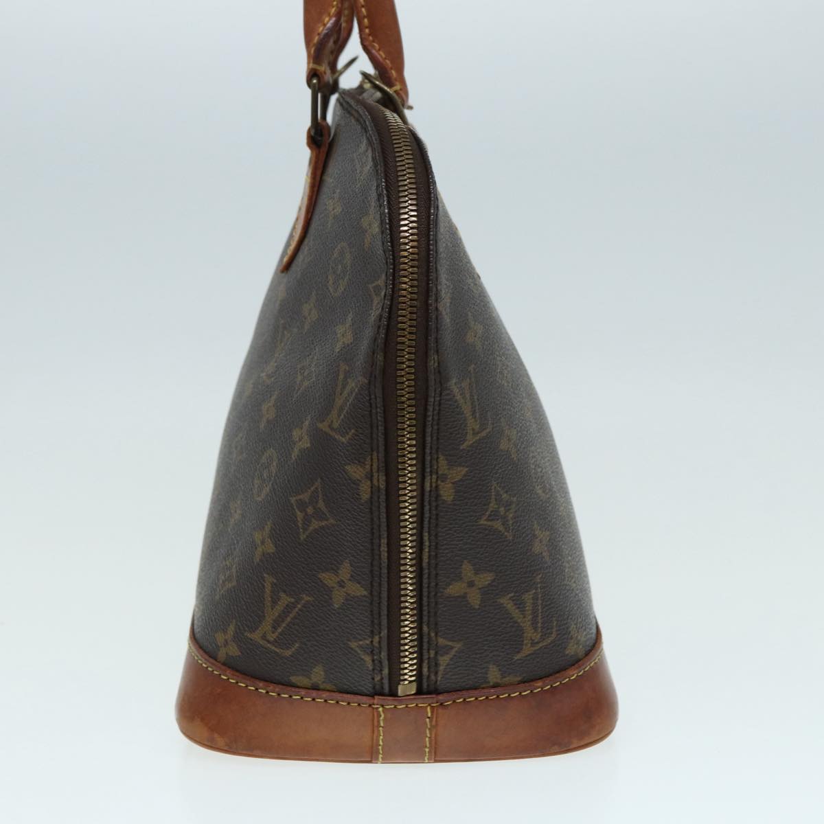 LOUIS VUITTON Alma Handbag
