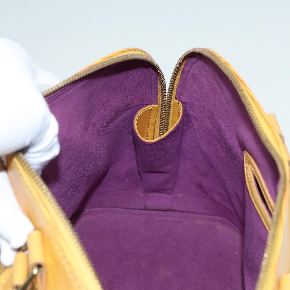 LOUIS VUITTON Alma Handbag