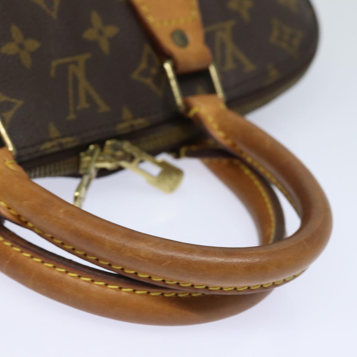LOUIS VUITTON Alma Handbag