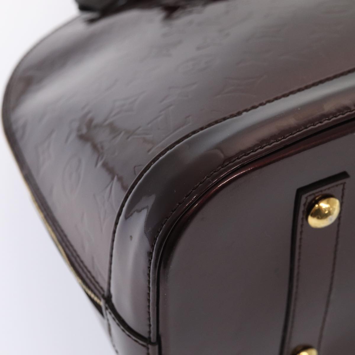 LOUIS VUITTON Alma Handbag