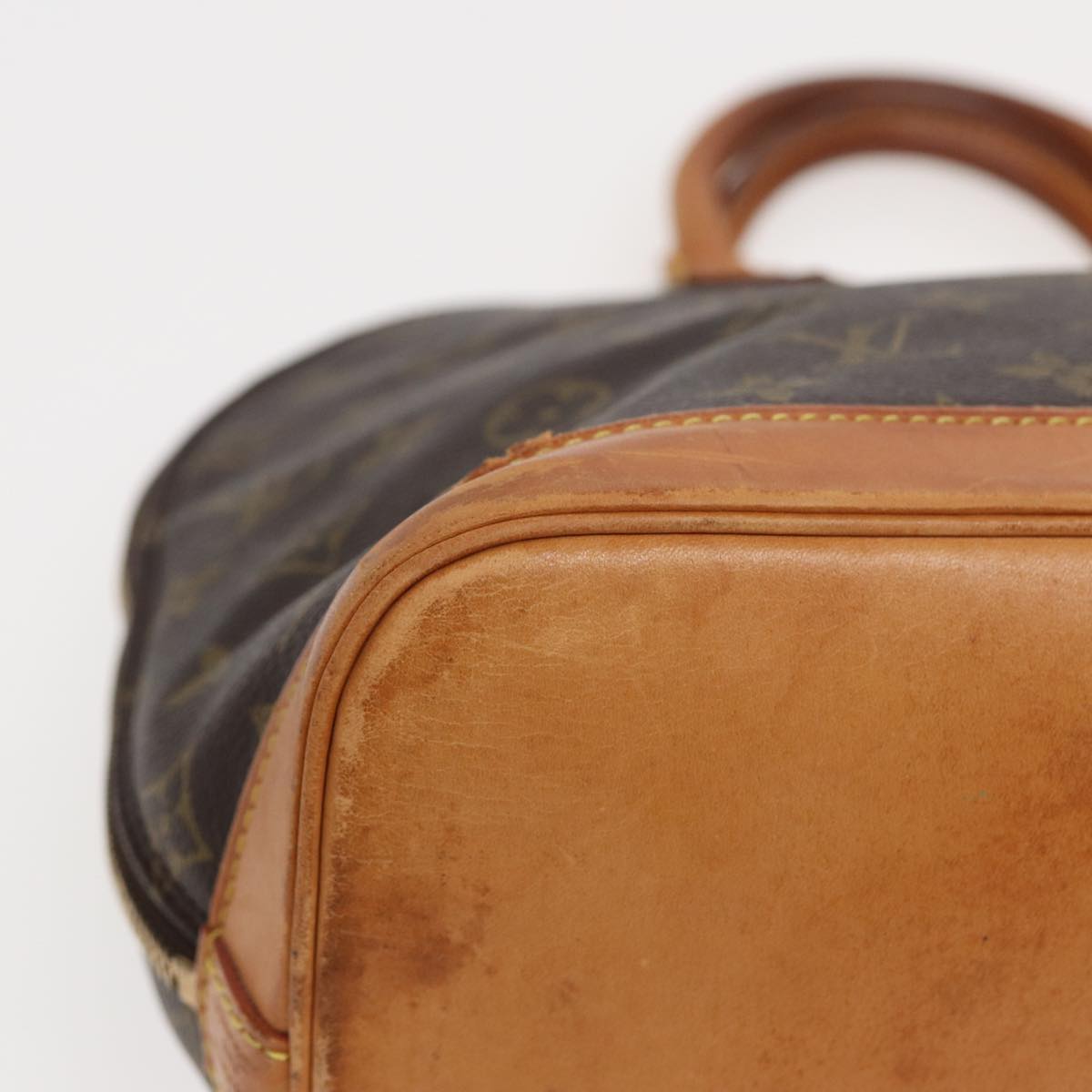 LOUIS VUITTON Alma Handbag