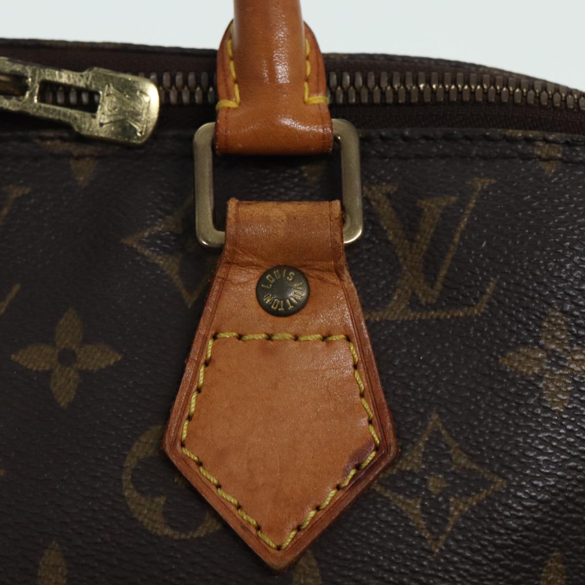 LOUIS VUITTON Alma Handbag