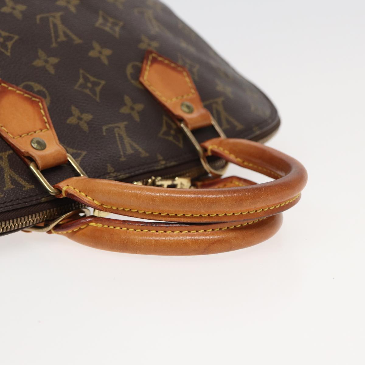 LOUIS VUITTON Alma Handbag