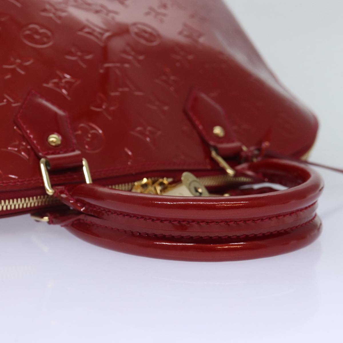 LOUIS VUITTON Alma Handbag