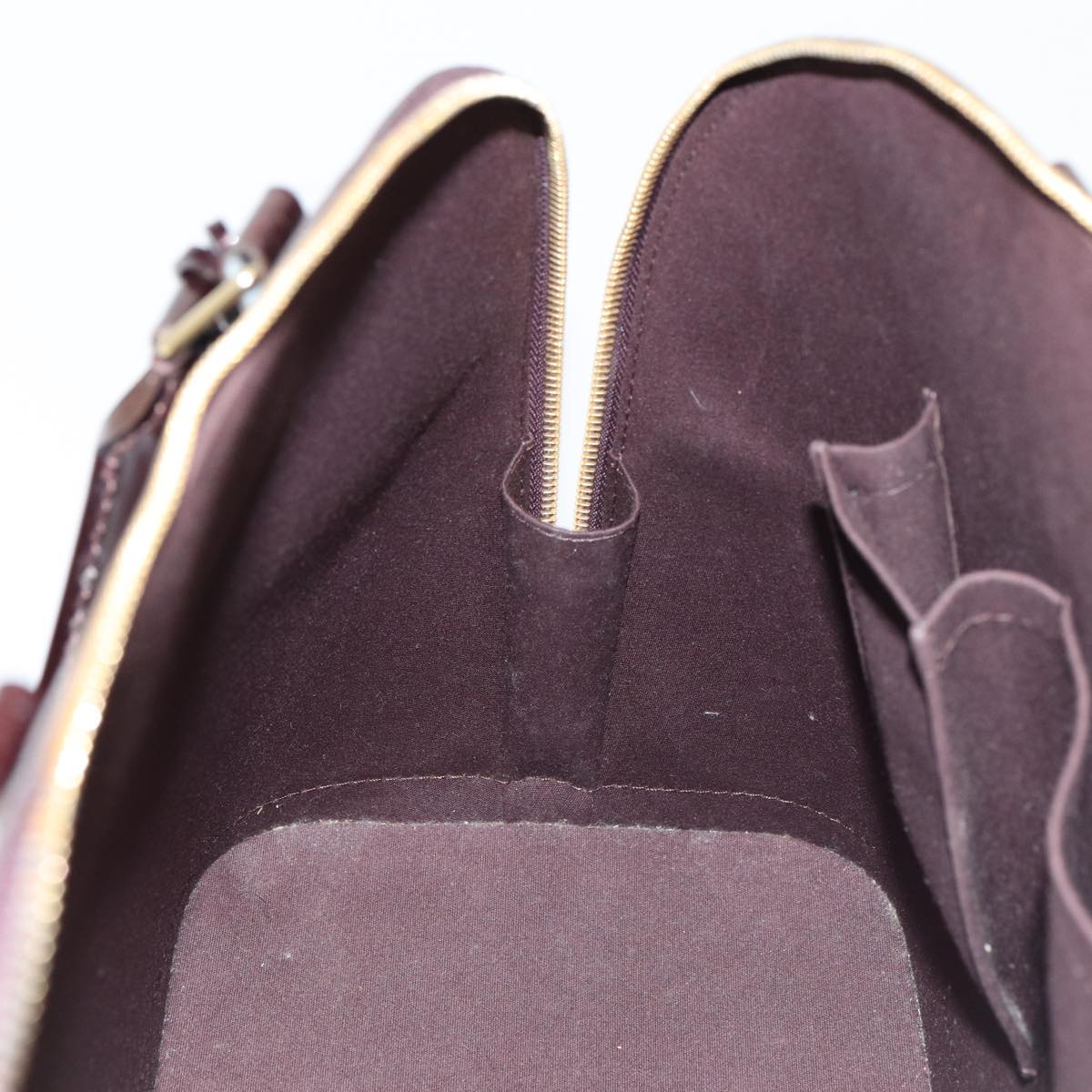 LOUIS VUITTON Alma Handbag