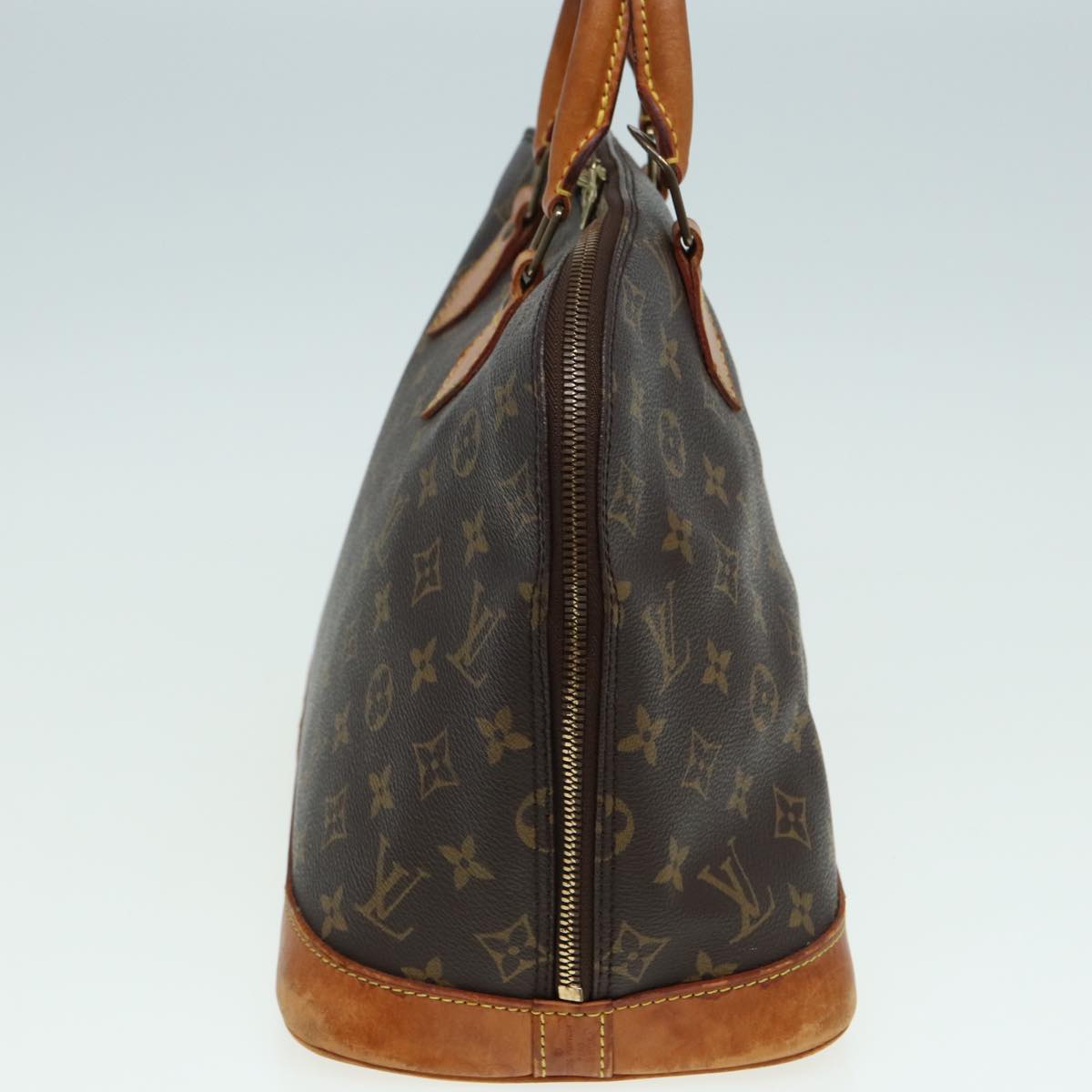 LOUIS VUITTON Alma Handbag