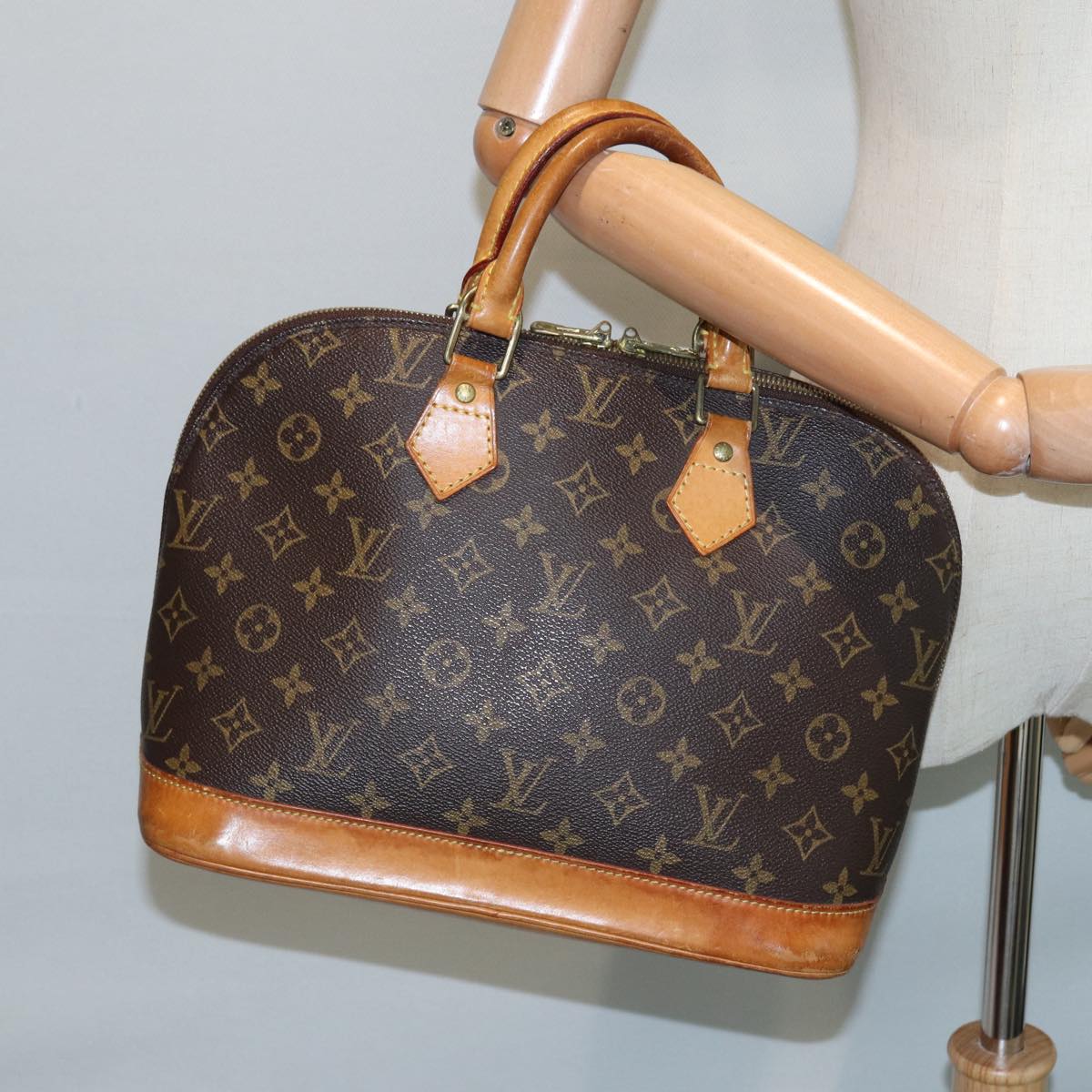 LOUIS VUITTON Alma Handbag