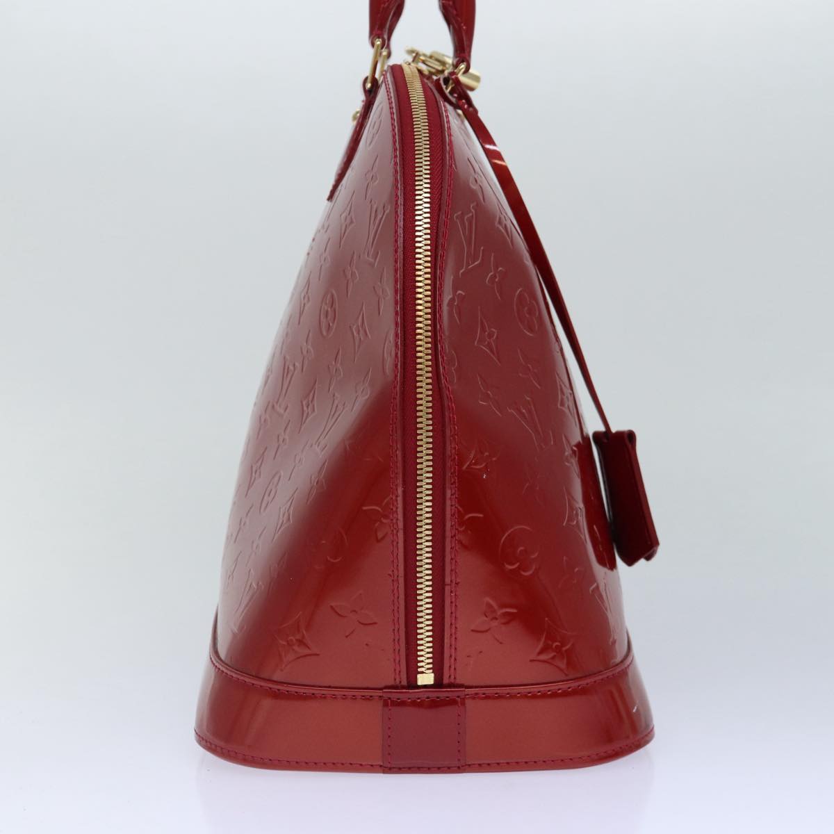 LOUIS VUITTON Alma Handbag