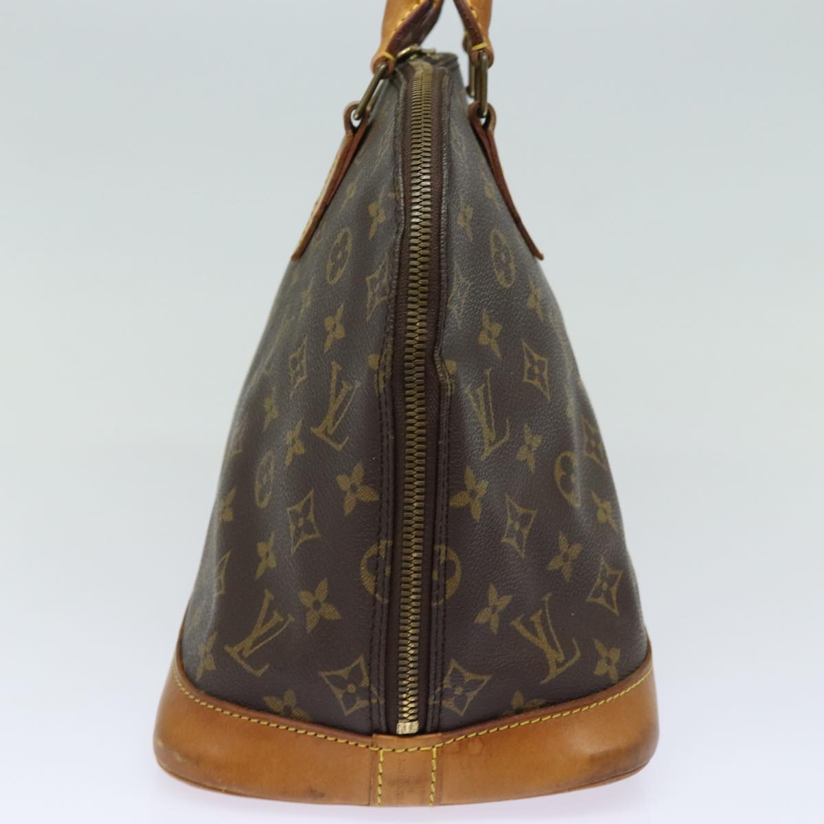 LOUIS VUITTON Alma Handbag