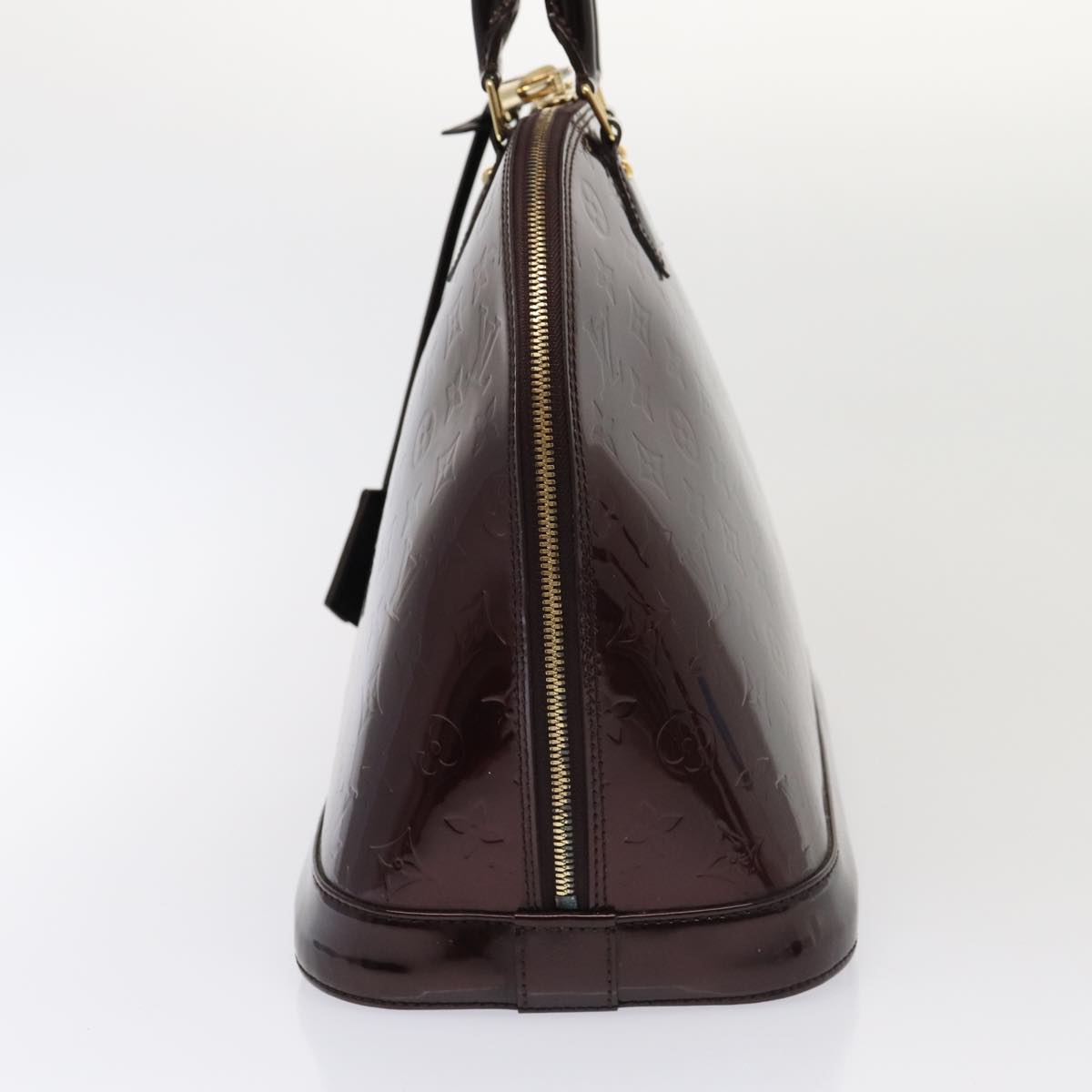 LOUIS VUITTON Alma Handbag