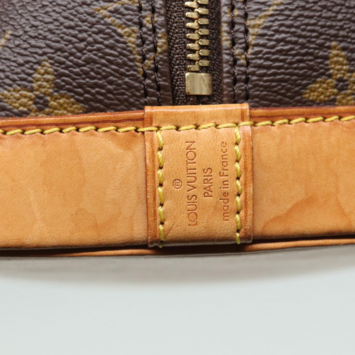 LOUIS VUITTON Alma Handbag