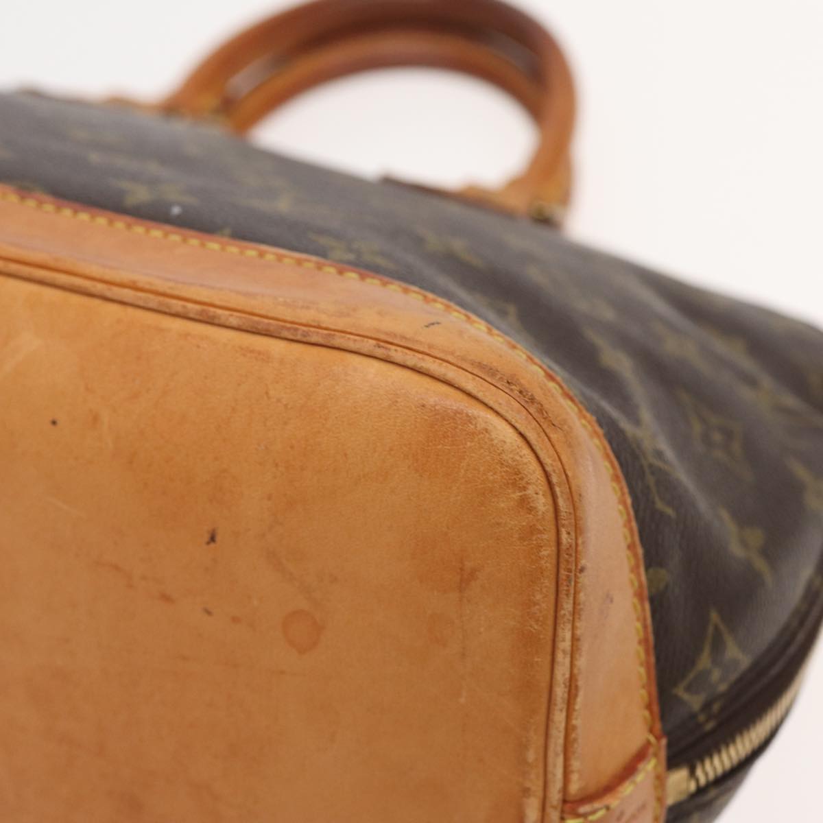 LOUIS VUITTON Alma Handbag