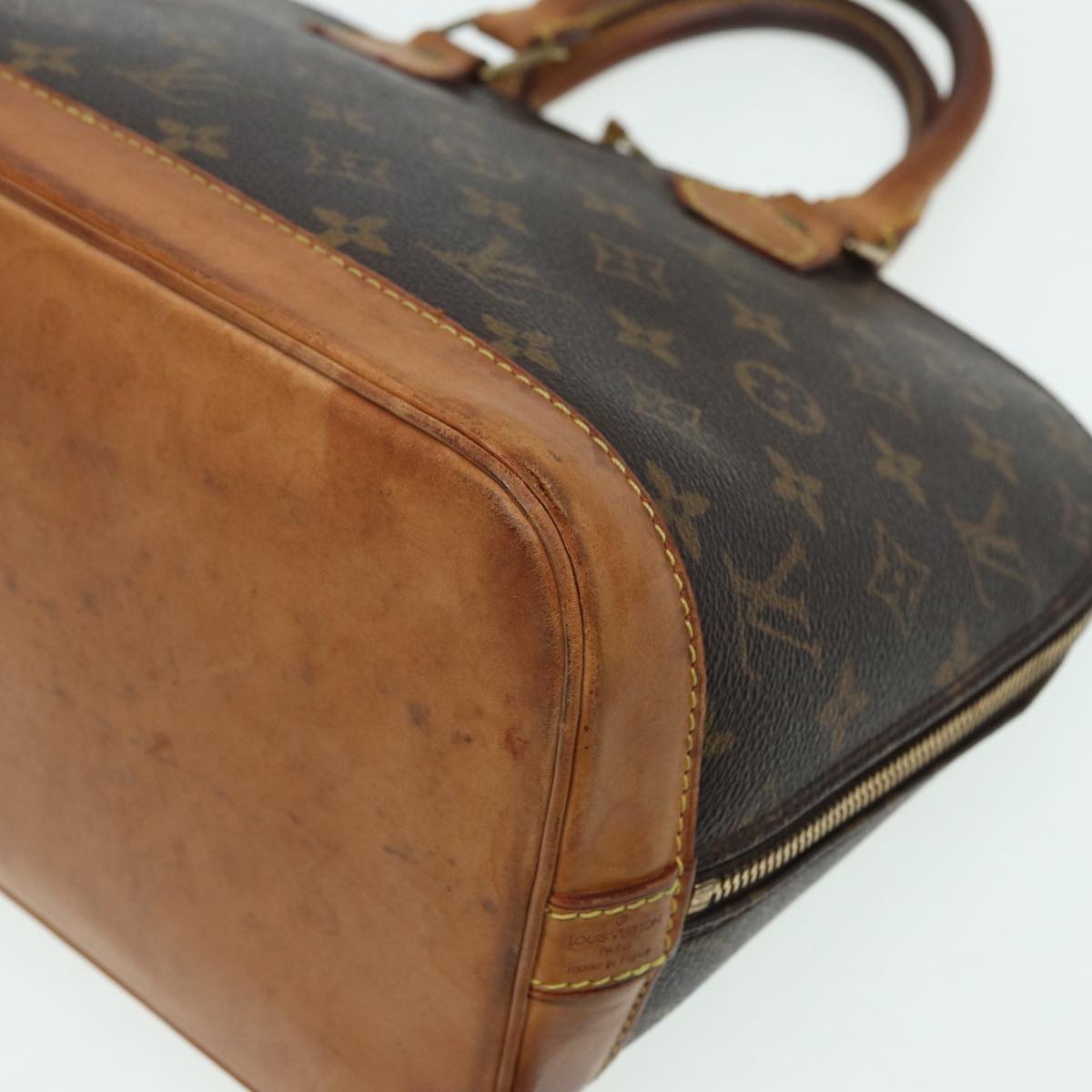 LOUIS VUITTON Alma Handbag
