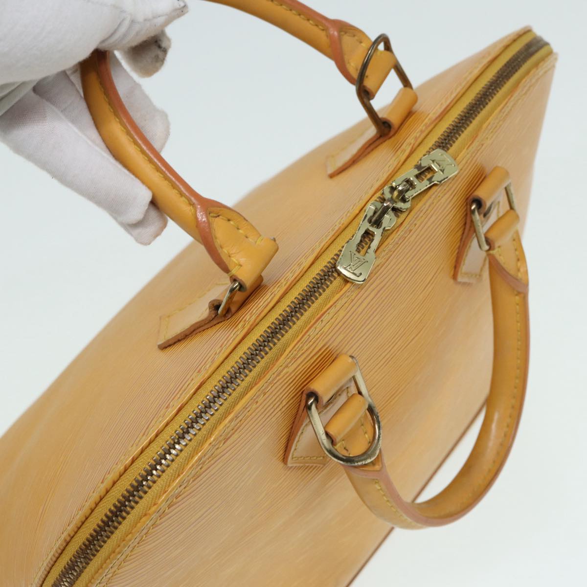 LOUIS VUITTON Alma Handbag