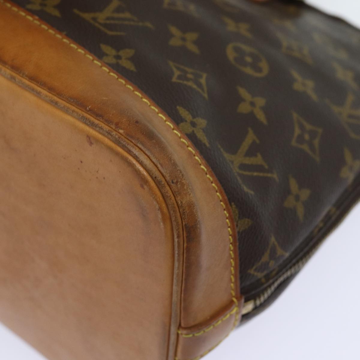 LOUIS VUITTON Alma Handbag