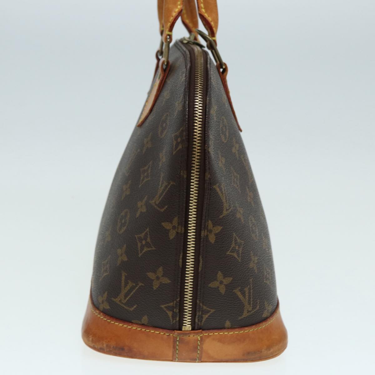 LOUIS VUITTON Alma Handbag