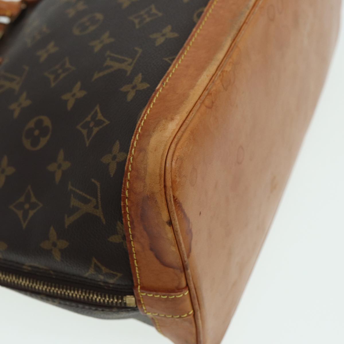 LOUIS VUITTON Alma Handbag
