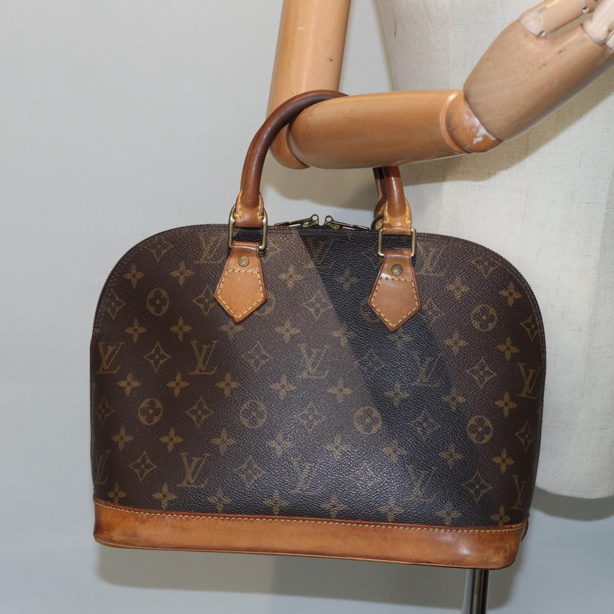 LOUIS VUITTON Alma Handbag