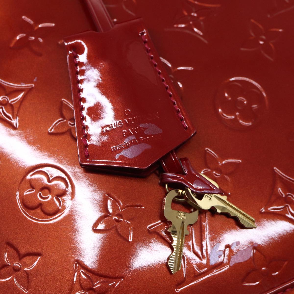 LOUIS VUITTON Alma Handbag