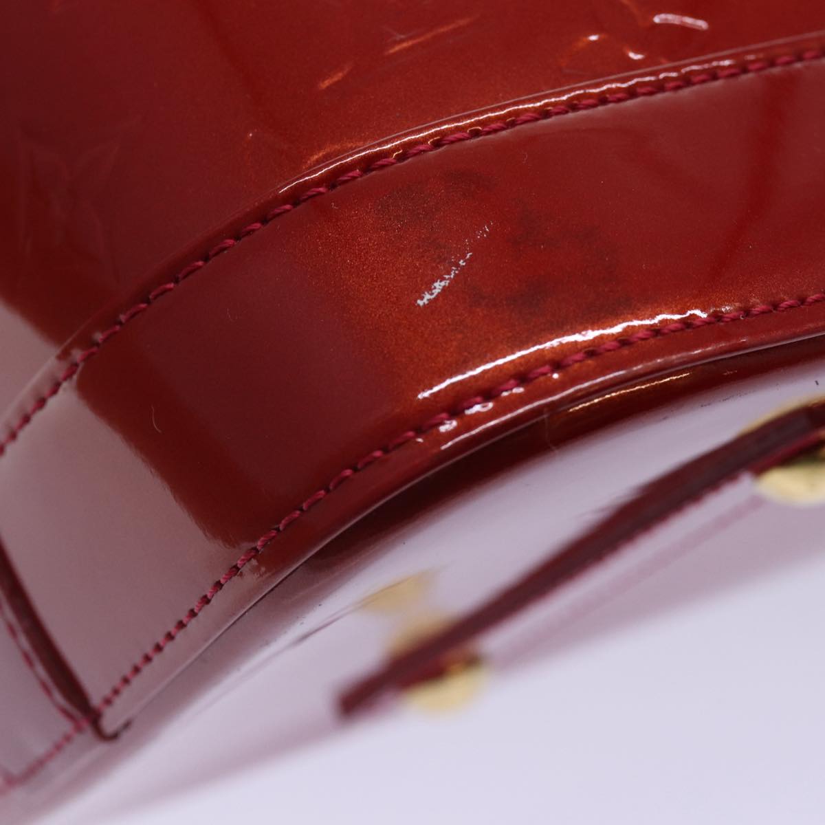 LOUIS VUITTON Alma Handbag