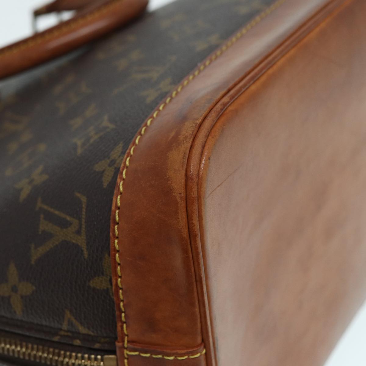 LOUIS VUITTON Alma Handbag