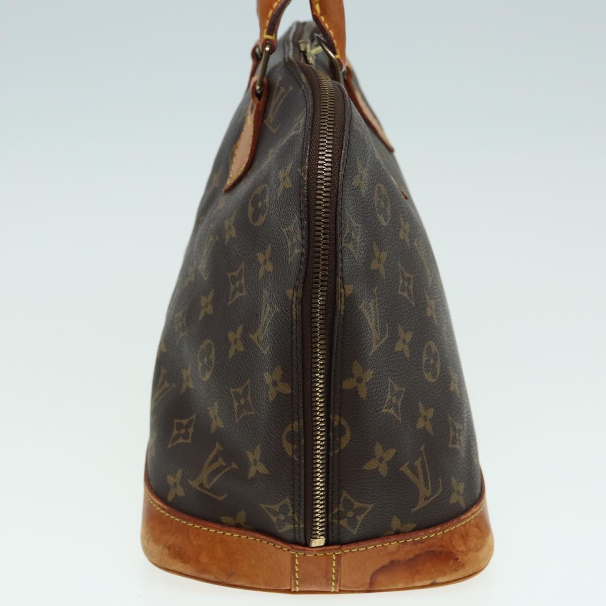 LOUIS VUITTON Alma Handbag