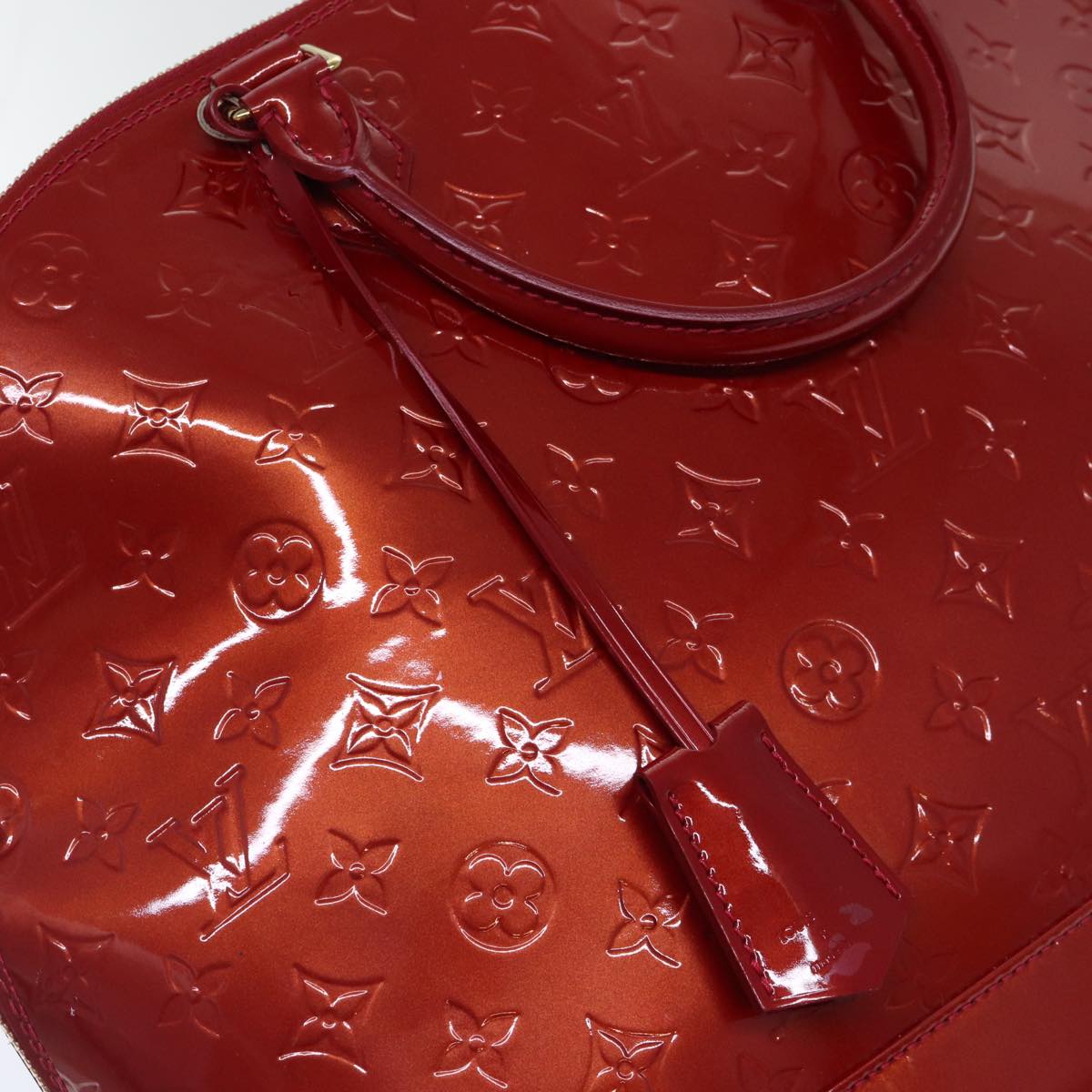LOUIS VUITTON Alma Handbag