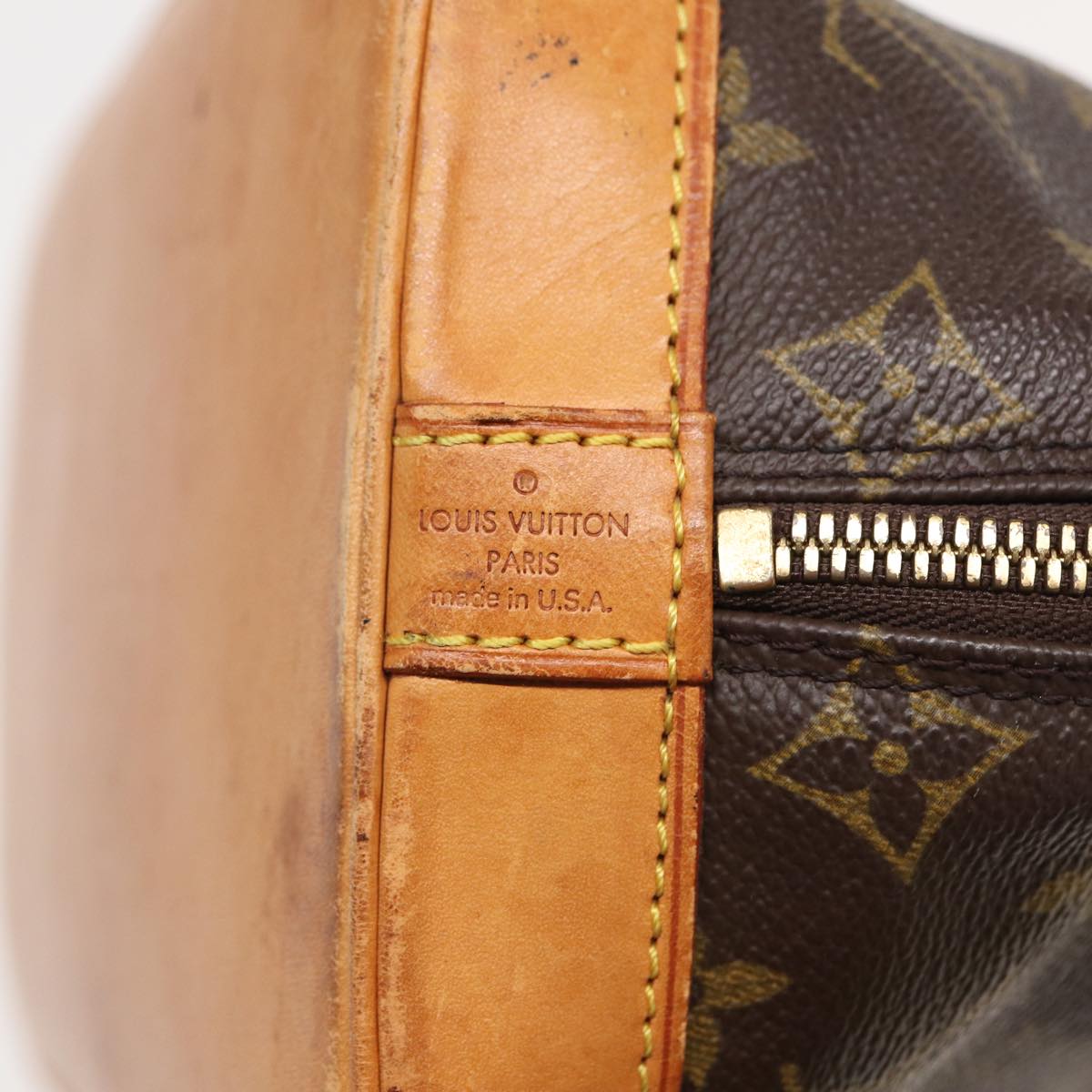 LOUIS VUITTON Alma Handbag