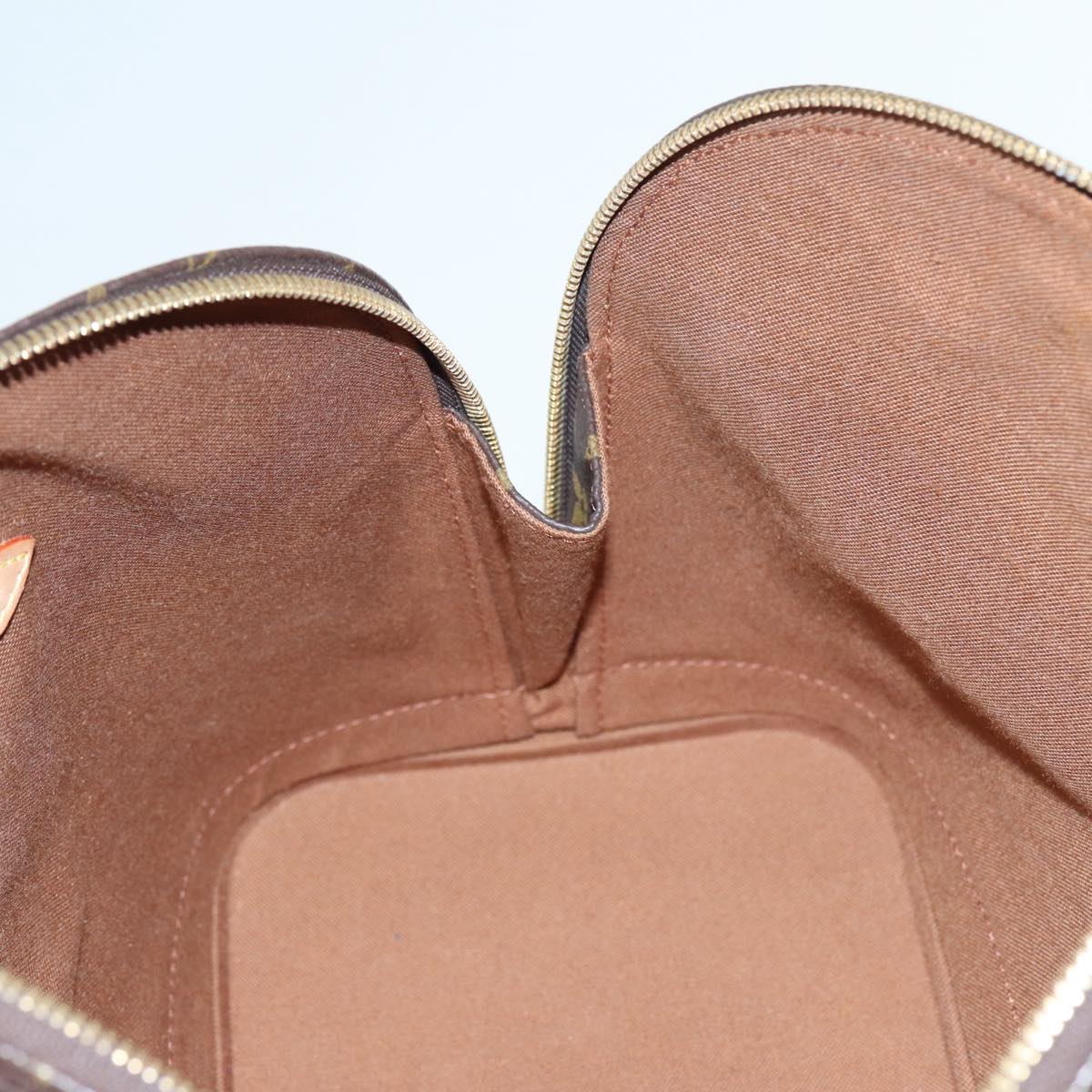 LOUIS VUITTON Alma Handbag