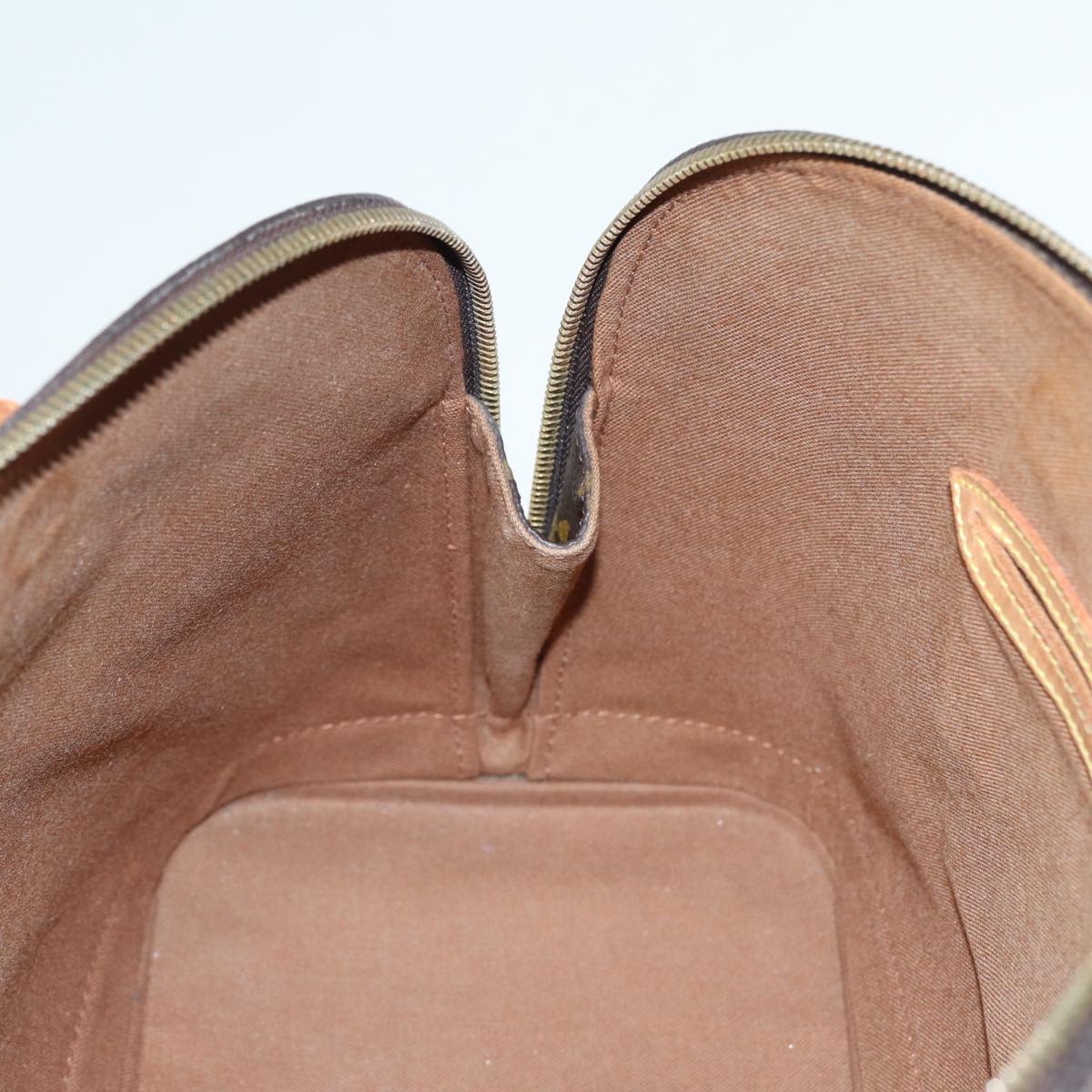 LOUIS VUITTON Alma Handbag